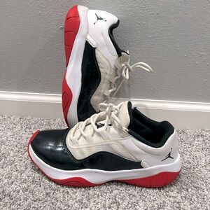 Jordan 11 low. Worn quite a few times, yet still good condition size 6.5 youth.
